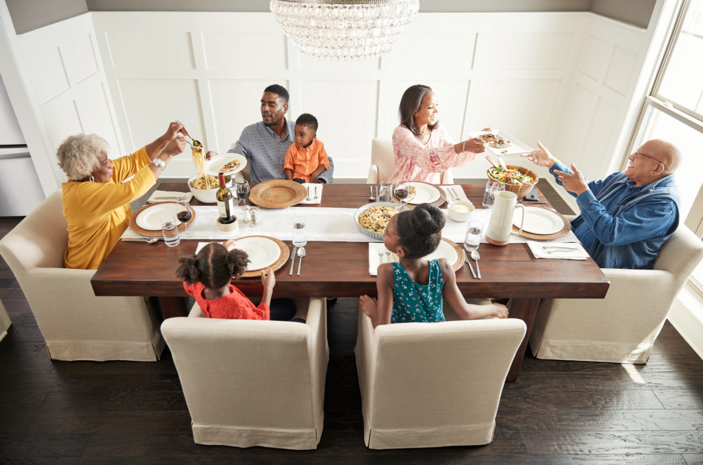 Family having breakfast at the dining table | Carpet Advantage